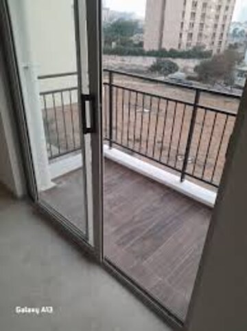 Balcony in 2 BHK Apartment at Signature Orchard Avenue 2, Sector 93 – for Rent