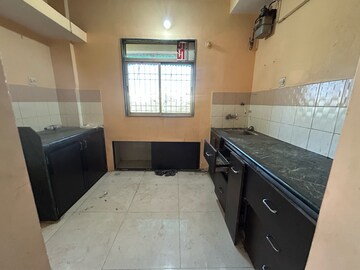 Kitchen in 1 BHK Apartment at Swastik Residency 1, Kavesar – for Rent