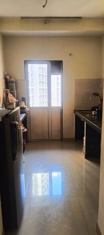 Kitchen in 1 BHK Apartment at Indiabulls Greens, New Panvel – for Rent
