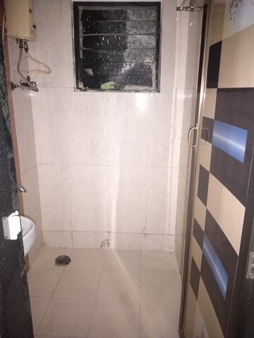 Bathroom in 1.5 BHK Apartment at Ganesh Plaza CHS, Khanda Colony – for Rent