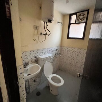 Bathroom in 2 BHK Apartment at Apex Our Homes, Garoli Kalan – for Rent
