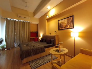 Master Bedroom in Studio Apartment at Gaur City Mall, Sector 4, Greater Noida – for Rent