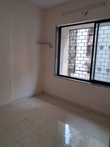 Master Bedroom in 1 BHK Apartment at Tilak Nagar Building, Tilak Nagar – for Sale