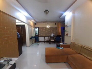 Living Room in 2 BHK Apartment at Riddhi Garden, Malad East – for Rent