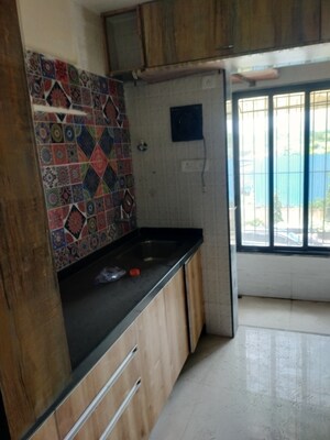Kitchen in 1 BHK Apartment at Raunak City Sector 4, Kalyan West – for Sale