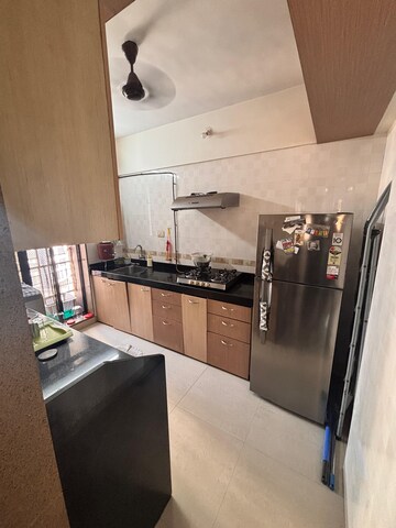 Kitchen in 2.5 BHK Apartment at Riddhi Tower, Malad East – for Rent