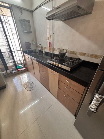Kitchen in 2.5 BHK Apartment at Riddhi Tower, Malad East – for Rent