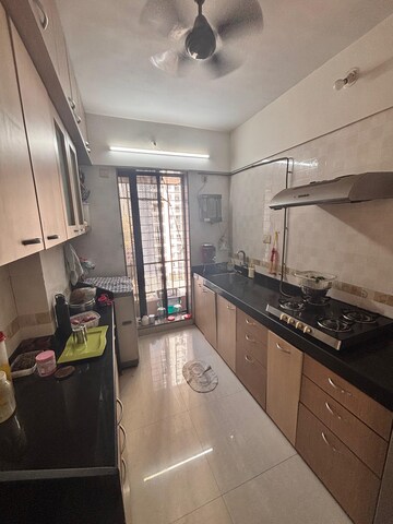 Kitchen in 2.5 BHK Apartment at Riddhi Tower, Malad East – for Rent
