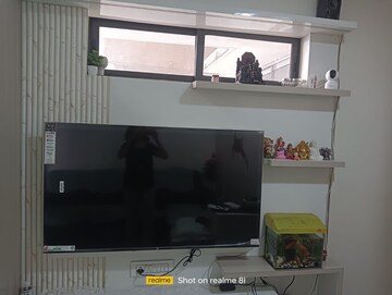 Living Room in 1 BHK Apartment at Lodha Palava Downtown, Dombivli East – for Rent