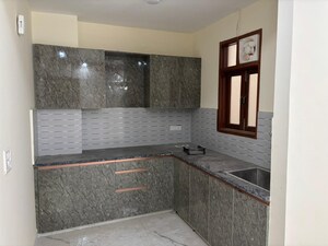 Kitchen in 2 BHK Builder Floor at Freedom Fighters Enclave – for Sale