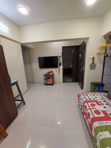 Living Room in 1 BHK Apartment at Jalmeena CHS, Vile Parle East – for Rent