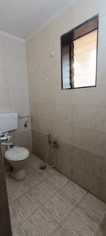 Bathroom in 2 BHK Apartment at Monarch Ambience, Kharghar – for Rent