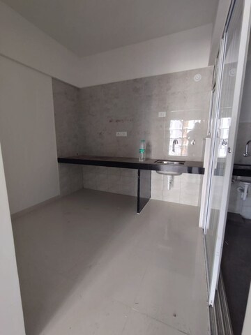 Kitchen in 2 BHK Apartment at Rama Livmo, Hinjewadi – for Rent