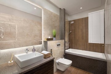 Bathroom in 4 BHK Apartment at Wave City, Wave City – for Sale