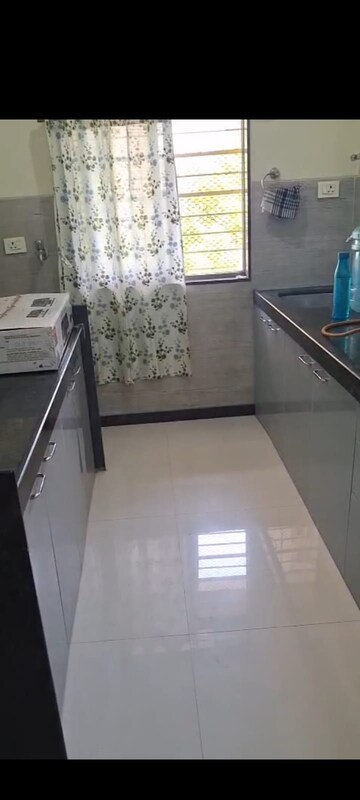 Kitchen in 2 BHK Apartment at Acme Ozone, Manpada – for Rent
