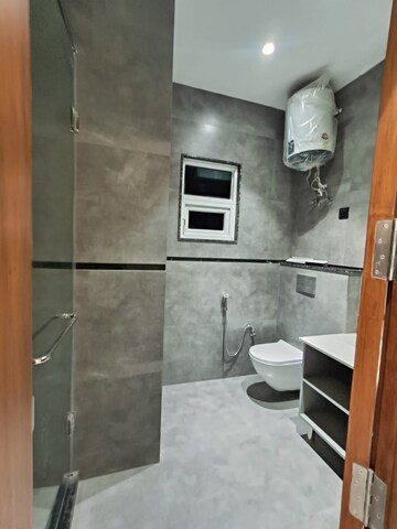 Bathroom in 3 BHK Builder Floor at Dwarka Mor – for Sale