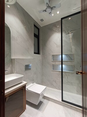 Bathroom in 4 BHK Builder Floor at Green Park – for Sale