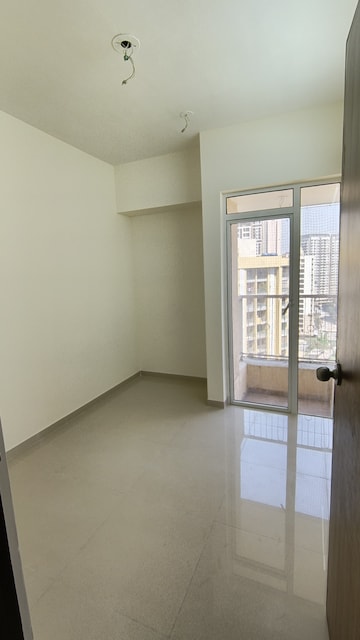Master Bedroom in 1 BHK Apartment at JP North Aviva, Mira Road – for Rent