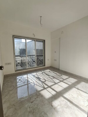 Master Bedroom in 2 BHK Apartment at Divine Blue Star CHS, Borivali West – for Sale