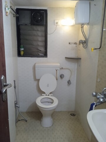 Bathroom in 2 BHK Apartment at Satellite Garden, Goregaon East – for Rent
