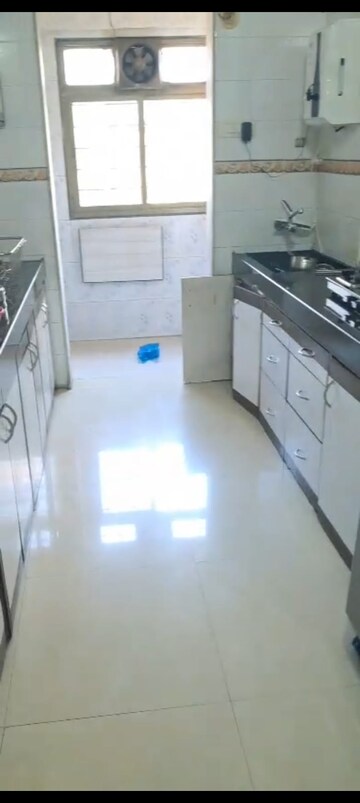 Kitchen in 3 BHK Apartment at Lok Sarita, Andheri East – for Sale