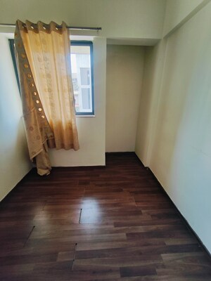 Master Bedroom in 1.5 BHK Apartment at Lodha Lakeshore Greens, Dombivli East – for Sale