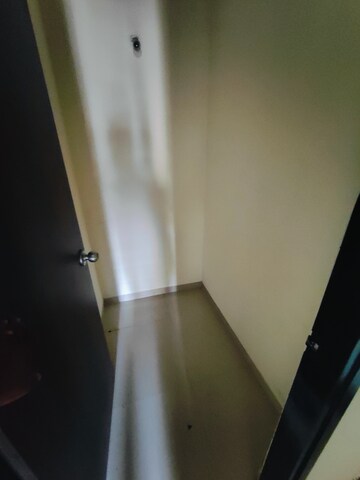 Master Bedroom in 1.5 BHK Apartment at Lodha Lakeshore Greens, Dombivli East – for Sale
