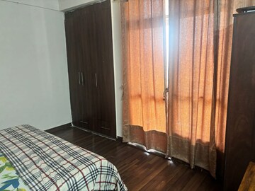 Bedroom in 3 BHK Apartment at Prateek Wisteria, Sector 77 – for Rent