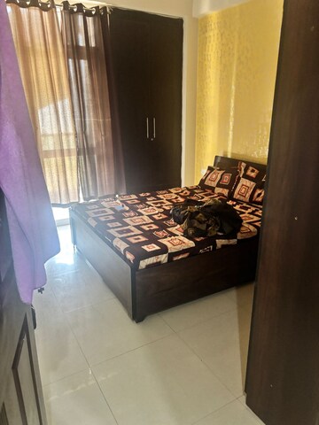 Bedroom in 3 BHK Apartment at Prateek Wisteria, Sector 77 – for Rent