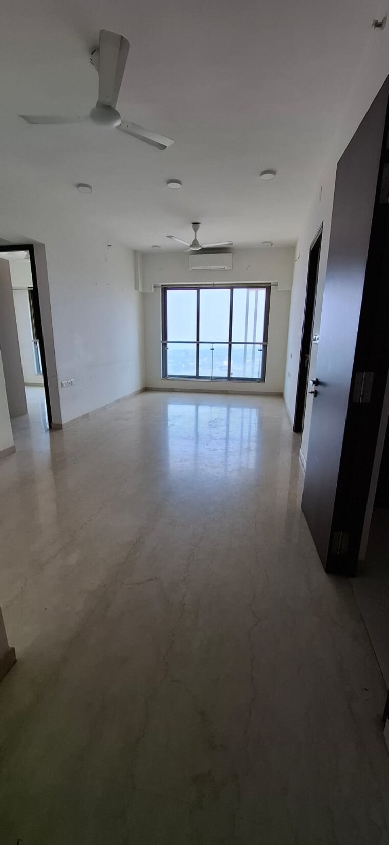 Living Room, peninsula-celestia-spaces 2 Bedroom 866 Sq.Ft. Apartment In Sewri Mumbai 8484049