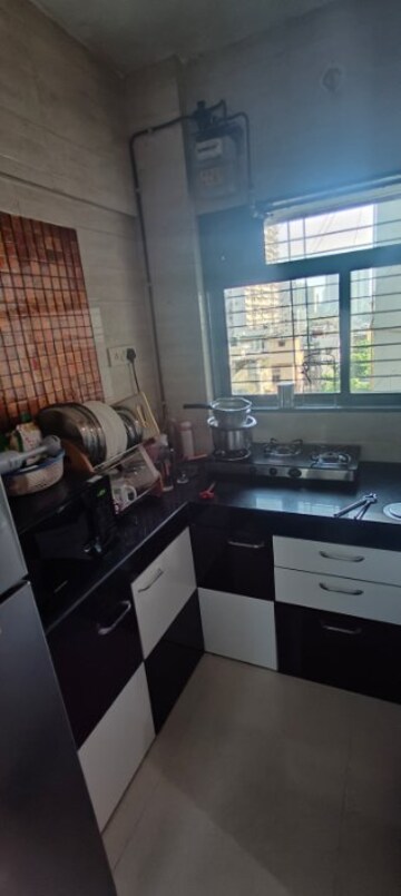 Kitchen in 1 BHK Apartment at Yash Amogh, Lalbaug – for Sale