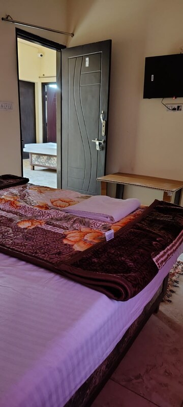 Bedroom in 3 BHK Builder Floor at Aman Luxury Apartments, Sahastradhara Road – for Rent