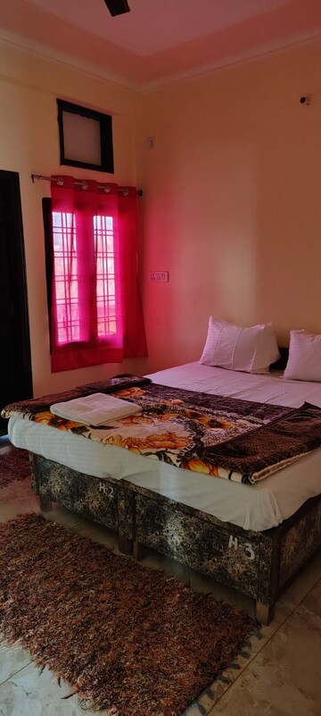 Bedroom in 3 BHK Builder Floor at Aman Luxury Apartments, Sahastradhara Road – for Rent