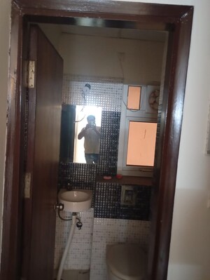 Bathroom in 2 BHK Apartment at Mahagun Moderne, Sector 78 – for Sale