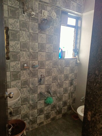 Bathroom in 1 BHK Apartment at Vihang Valley Phase 3, Kasarvadavali – for Rent