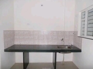 Kitchen in 2 BHK Apartment at Venkatesh Fortune Plaza, Kharadi – for Rent