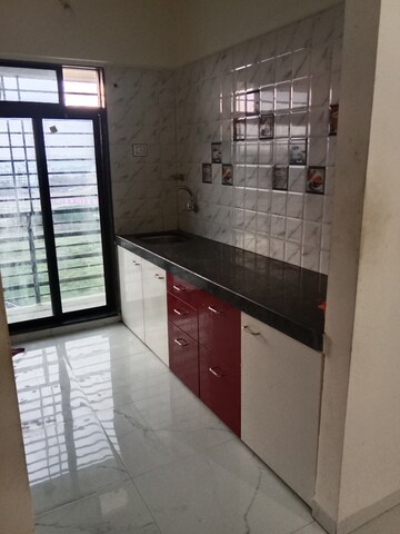 Kitchen in 2 BHK Apartment at Navkar City Phase I, Naigaon East – for Rent