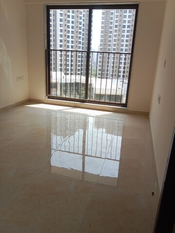 Master Bedroom in 1 BHK Apartment at Sunteck Maxxworld, Naigaon East – for Rent