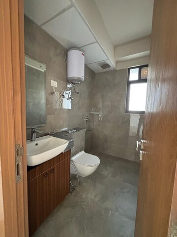Bathroom in 3 BHK Apartment at Shapoorji Pallonji Joyville Phase 2, Sector 102 – for Rent