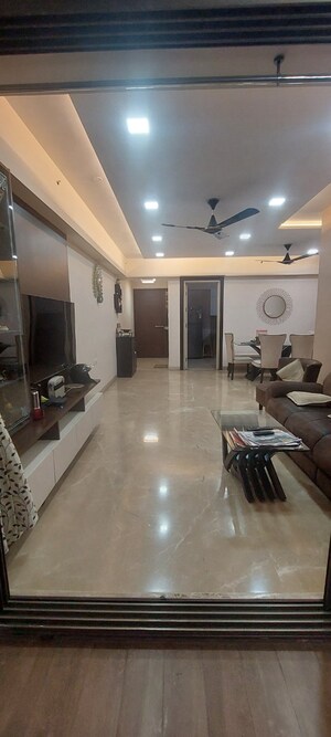 Living Room in 3 BHK Apartment at T Bhimjyani Neelkanth Woods, Manpada – for Sale