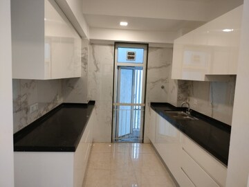 Kitchen in 3 BHK Apartment at Ruparel Ariana, Parel – for Rent