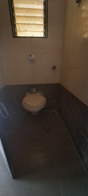 Bathroom in 1 BHK Apartment at DGS Sheetal Sweet Seven , Malad West – for Sale