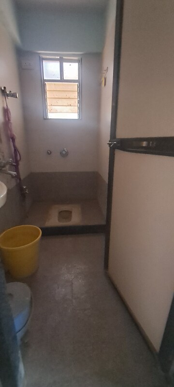 Bathroom in 1 BHK Apartment at DGS Sheetal Sweet Seven , Malad West – for Sale