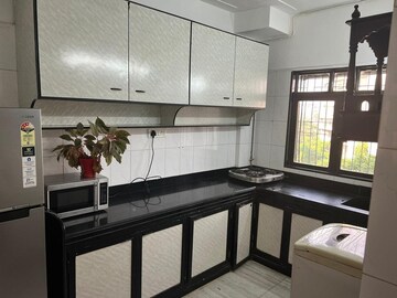 Kitchen in 1 BHK Apartment at Juhu Abhishek Chs Ltd, Andheri West – for Rent