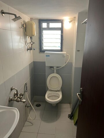 Bathroom in 1 BHK Apartment at Juhu Abhishek Chs Ltd, Andheri West – for Rent