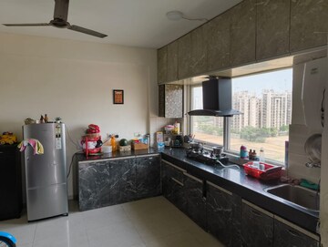 Kitchen in 2 BHK Apartment at Signature Global Grand Iva, Sector 103 – for Sale