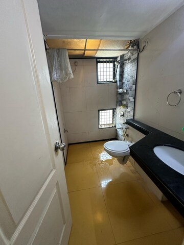 Bathroom in 4 BHK Apartment at Suchidham Complex, Goregaon East – for Rent