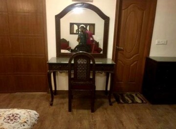 Living Room in 4 BHK Apartment at Unitech Heritage City, Sector 25 – for Rent
