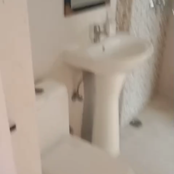 Bathroom in 3 BHK Apartment at Nirala Aspire, Panchsheel Green – for Sale