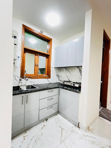 Kitchen in 1 BHK Apartment at Freedom Fighters Enclave – for Rent